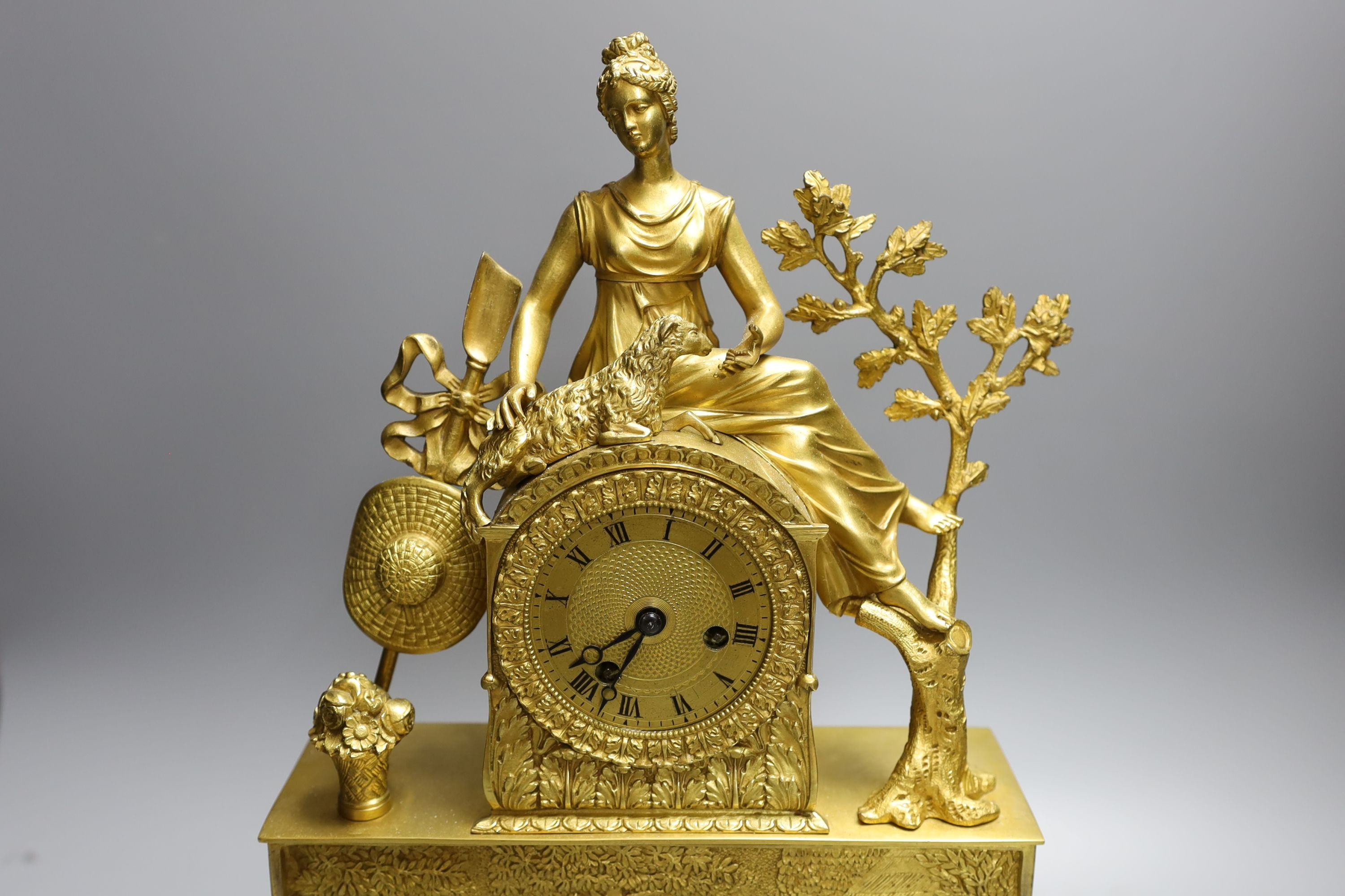 A 19th century Louis XVI style ormolu mantel clock with Shepherdess - 40cm high